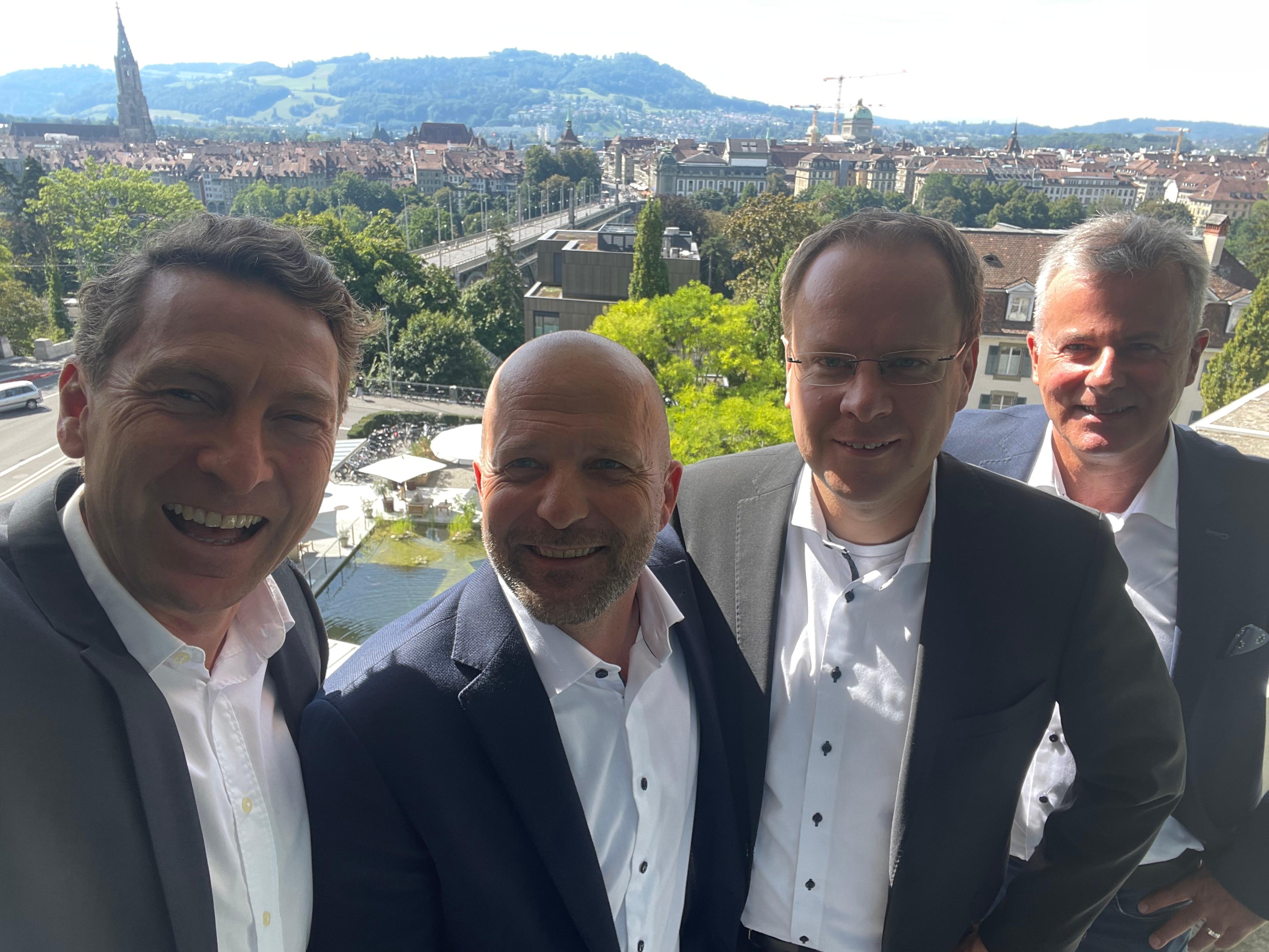 photo of four men in a suit, from left to right: Oskar Zodel, CEO msg systems ag (Switzerland) and VRP BTPAG - Remo Tschanz, Deputy of the VR BTPAG, Dr. Jürgen Zehetmaier, Board of Management msg - Marc Baeriswyl, CFO BTPAG