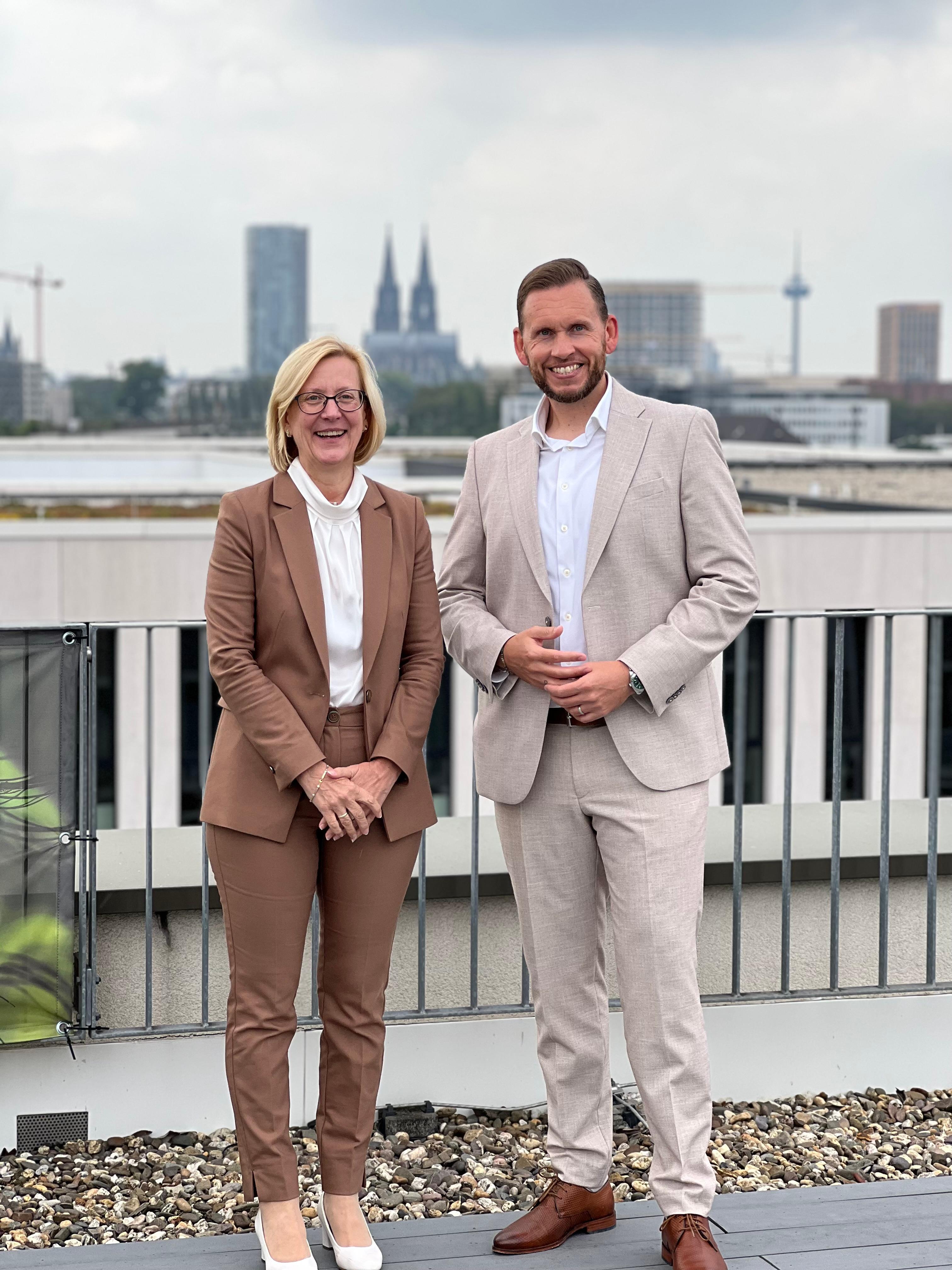 photo of Dr. Andrea van Aubel, member of the msg executive board and Daniel Karadza, Country Manager Germany and Senior Director Commercial & Enterprise Sales Germany, Genesys